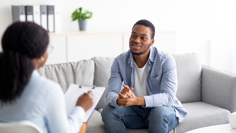 Effective,Psychotherapy.,Young,Black,Guy,Talking,To,His,Psychologist,,Receiving